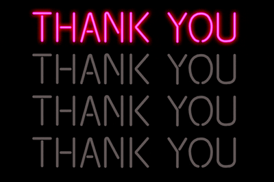 Pink neon sign that says 'Thank you'